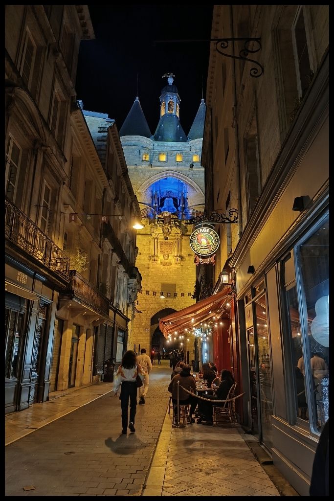 Grosse Cloche illuminated at night with a blue glow 4-days in Bordeaux Itinerary