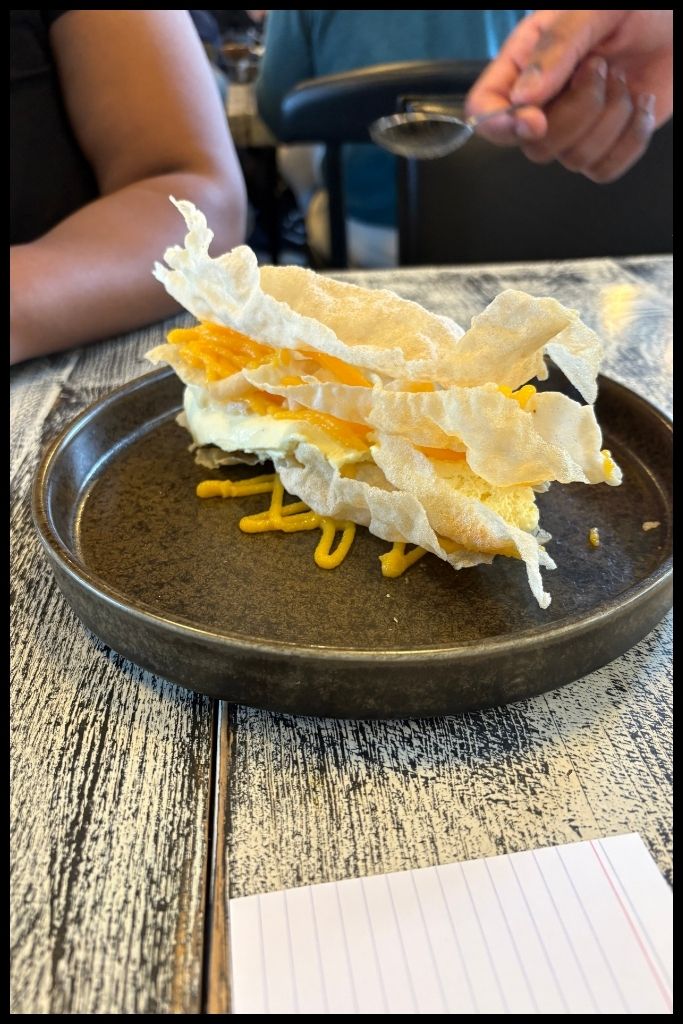 Where to Eat Bacalhau in Porto: The Salted Cod ‘Mil Folhas’—layers of pastry, sweet egg cream, and vanilla ice cream.